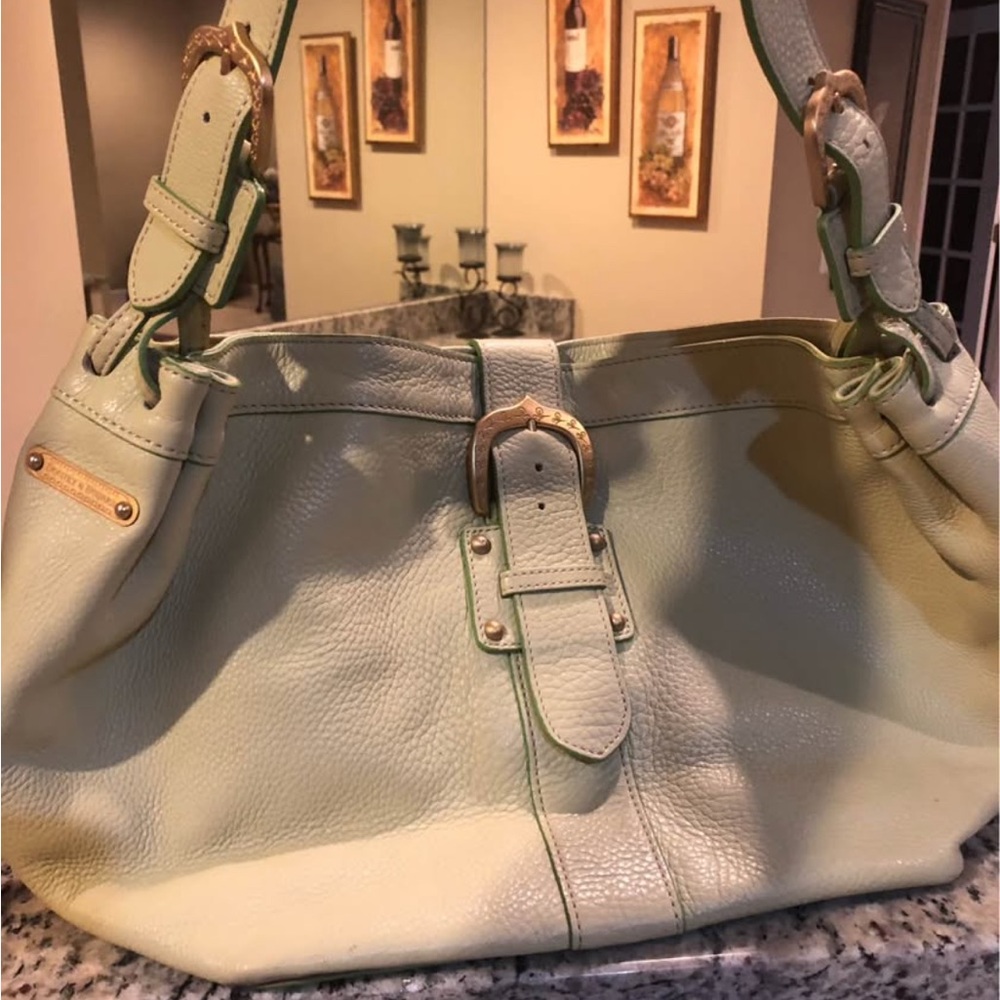 Dooney and Bourke leather handbag
Like new
Light green color